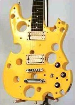 <b>It'll be hard for you to tell whether you want to play or eat these axes.</b> Unusual Guitars, Guitar Obsession, Guitar Acoustic, Unique Guitars, Cool Electric Guitars, Beautiful Guitars, Guitar Art, Custom Guitars, Guitar Design