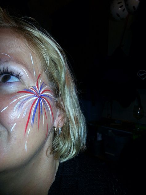 Fireworks Fourth of July Face Paint Memorial Day Face Paint, 4th Of July Body Art, 4th Of July Leg Painting Ideas, Football Game Makeup High School, Leg Painting Body Art 4th Of July, Blue And White Face Paint, Fireworks Face Paint, Canada Day Face Painting Ideas, Forth Of July Face Painting