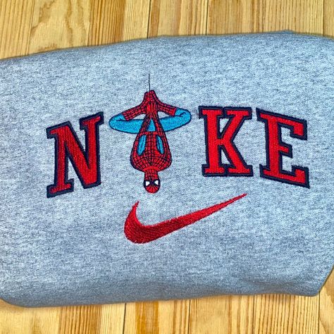 Stitched On A Gildan Unless Stated Otherwise Please Allow Us One Day Of Processing If You Have Any Custom Questions Pm Us! Nike Embroidered Sweatshirts, Nike Custom Crewneck, Women Nike Sweatshirt, Spiderman Hoodie Nike, Spider Man Nike Sweatshirt, Spiderman Sweaters, Cute Nike Clothes, Spider Man Sweater, Custom Sweatshirt Ideas