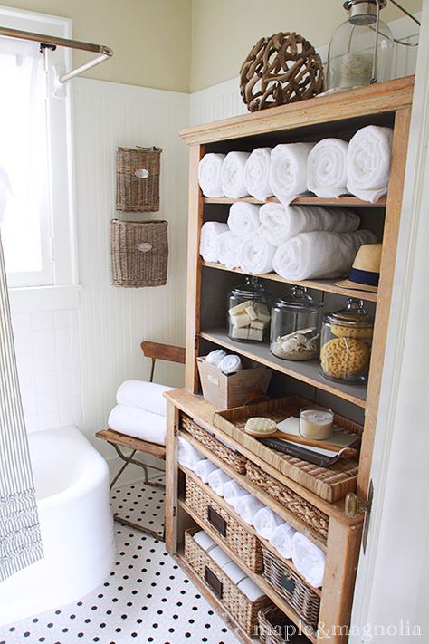 Hutch in the bathroom. Love! Natural materials and white. Curved tub, polka dot floor. Design Seeds, Cottage Bath, Pine Cabinets, Bad Inspiration, Cottage Bathroom, Bathroom Storage Organization, Massage Room, Natural Home Decor, Cool Ideas