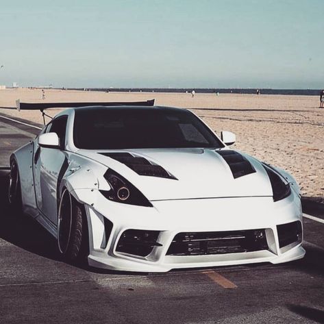 Front nissan 370z #widebody #370z #350z #nismo #gtr #rocketbunny #libertywalk #slammed #、stanced #loweredlifestyle #lowered #low #boosted… Wels, 370z Custom, 350z Nismo, Nismo Gtr, Alpha Romeo, Nissan Z Cars, Best Jdm Cars, Nissan Z, Nissan Cars