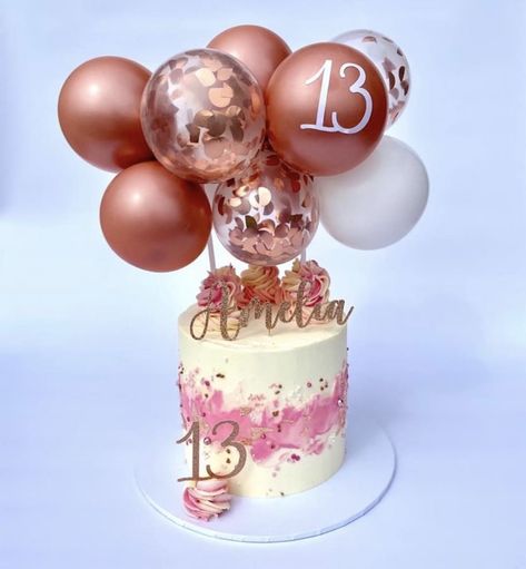 We love this rose gold tones with confetti balloons for this balloon cake topper we created 🤗 stunning cake by @bryncottagecafe #ballooncaketopper #caketopper #balloontopper #balloongarland #smallballoongarland #cakeinspiration #balloonndecoration #cakeideas #13thbirthday 13 Birthday Cake Topper, 13yrs Old Birthday Ideas, 13th Bday Cake Ideas, Birthday Cakes For 13 Year Girl, Girls 13th Birthday Cake, Balloon Topper Cake, Cake Ideas For Teenage Girl, 12th Birthday Cake Girl, 13th Birthday Cake Ideas For Girls 13