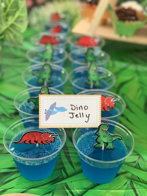 Dinosaur Party Snack Ideas, Dinosaur Jello Ideas, Dinasour Dessert Ideas, First Birthday Dinosaur Theme Decorations, Jurassic Park Themed Birthday Party, Simple Dinosaur Decorations, Dinosaur Treat Table Ideas, Cute Dino Cupcakes, Dinosaur Jello Shots