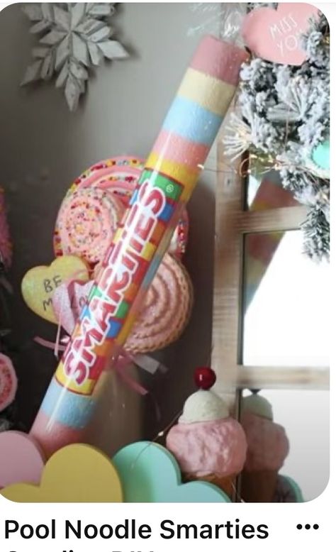 Oversized Candy Props, Candy Themed Christmas Party, Pool Noodle Candy Necklace, Lifesize Candy Decorations, Pool Noodle Gingerbread House, How To Make Big Candy Decorations, Candy Land Christmas Outdoor Diy, Christmas Crafts Pool Noodles, Christmas Candy Land Decorations Diy