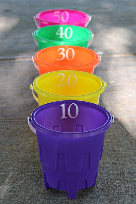 Bucket Ball Toss – you will need 5 buckets, 3 soft balls, and sticky numbers. I used my vinyl cutter to make numbers for each bucket, you could also use sticky letters. Cost – $6 Outside Games, Reunion Games, Outdoor Games For Kids, Water Games, Water Party, Summer Games, Backyard Games, Carnival Games, Kids Party Games