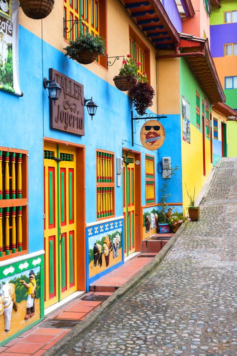 Guatape, Colombia Fonda Paisa, Latin America Travel, Colorful Places, Colombia Travel, Colourful Buildings, Destination Voyage, Travel South, South America Travel, Beautiful Places To Visit