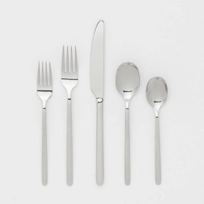 The 20-Piece Stainless Steel Silverware Set sets an elegant table with a polished luster. It is made from stainless steel in a shiny silver finish, which matches well with your existing cutlery and elevates everyday meals into a fine dining experience. The tableware set serves four people and comes with all the basic pieces needed for serving ideal for families, entertaining and parties. Each piece is dishwasher safe for lasting shine through many uses. | Latitude Run® 20Pc Stainless Steel Silve Bistro Huddy, Kitchen Moodboard, Target Kitchen, Silver Room, Stockholm Apartment, Rent House, White Dinnerware Set, Stainless Steel Silverware, Bachelorette Pad