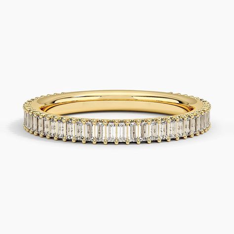 Petite Lina Baguette Diamond Wedding Ring - 18K Yellow Gold. Shining baguette diamonds are vertically set in this modern ring and wrap three-fourths of the way around the band for a sophisticated look with a comfortable fit (5/8 total carat weight). Baguette, Brilliant Earth Wedding Band, Baguette Eternity Ring, Unique Wedding Bands For Women, Baguette Wedding Rings, Gold Band Engagement Rings, Baguette Wedding Band, Gold Wedding Bands Women, Baguette Diamond Ring