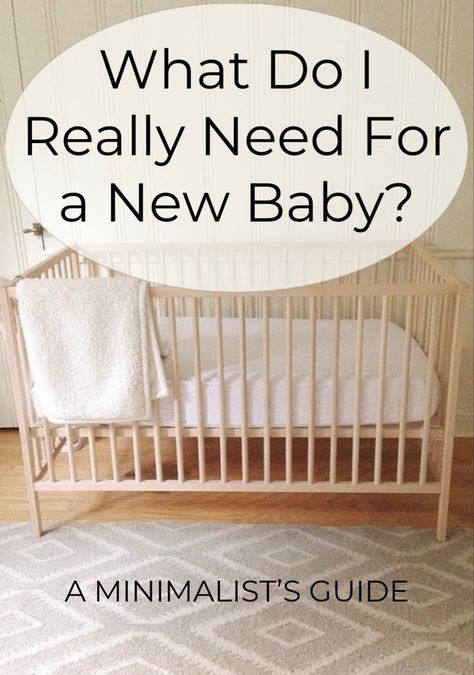 A crib made of natural wood with a cream blanket draped over the side. New Nursery Ideas, Scandi Nursery Neutral, Nursery Necessities Checklist, Small Nursery Room Layout, Furniture For Nursery, Minimalist New Mom Essentials, How To Set Up Nursery Room, Nursery Room Essentials, Simple Apartment Nursery