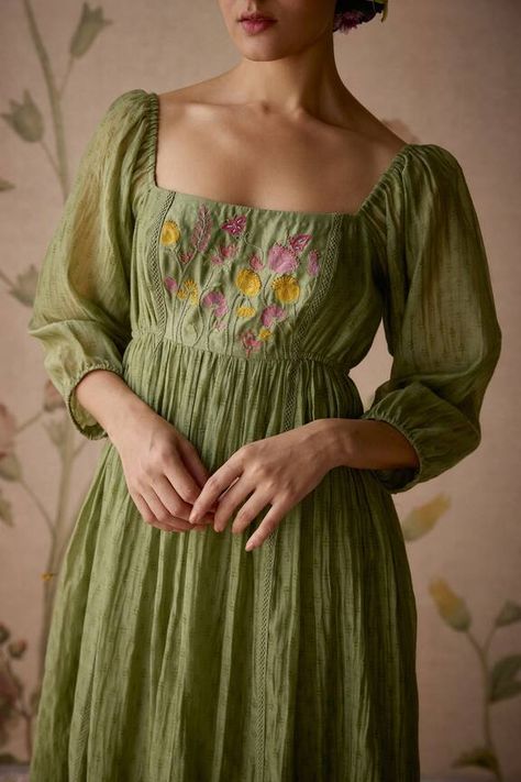 Green gathered flared chanderi tunic with floral block prints and hand embroidered yoke. - Aza Fashions