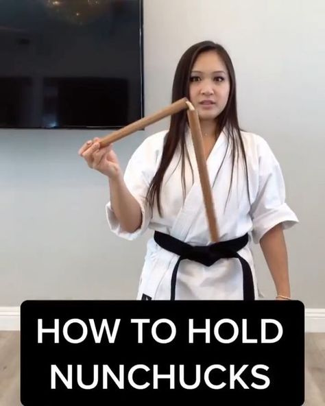 How to hold Nunchuks Credit: https://www.instagram.com/gemmasaur/ How To Use Nunchucks, Nunchaku Training, Muay Thai Martial Arts, Gym Workout Apps, Martial Arts Gif, Learn Krav Maga, Self Defence Training, Self Defense Moves, Kung Fu Martial Arts