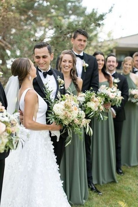 Bridal Party With Green Dresses, Sage Green Bridesmaid Black Groomsmen, Green Bridesmaids Dresses With Groomsmen, Sage Green Wedding Groomsmen Black Suit, Black Suit Green Bridesmaid, Eucalyptus Wedding Party Attire, Sage Green And Grey Bridal Party, Safe Green Bridal Party, Sage And Black Bridal Party