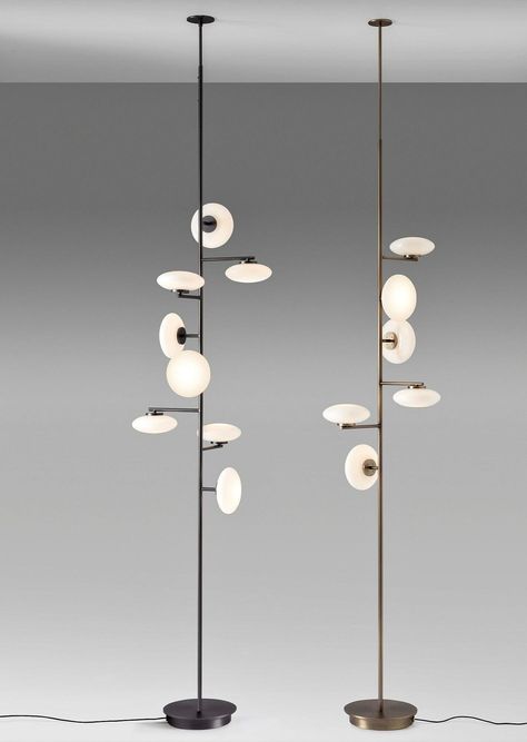 The Mamì floor ceiling lamp by Penta Light is a versatile and elegant, halfway between design and art. The white oval blown-glass body is reinterpreted with a modernist look in the suspension compositions, while remaining linear in the floor and table. Designed by Umberto Asnago, 100% made in Italy. Available in: Structure colour Matt Black or Brushed Bronze. Technical information: Dimensions: extra small: Ø32 x W50 (height min 220 cm - max 250 cm) small: Ø32 x W50 (height min 250 cm - max 280 c Custom Interior Doors, Large Floor Lamp, Bronze Lighting, Contemporary Lamps, Floor Ceiling, Contemporary Floor Lamps, Design And Art, Floor Lamp Design, Brushed Bronze