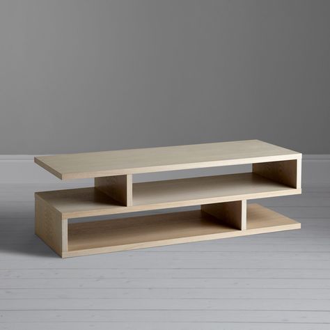 Balance Coffee Table by Sir Terence Conran:  The enclosed spaces allow for the display of books, while decorative objects placed in the open spaces appear to be balancing as if on the end of a cantilevered shelf. Awarded a Design Guild Mark in 2015. #innovativetable #designaward Simple Tv Table Design, T V Tables, T V Stand Design, T V Stand Design Simple, Cute Tv Stand Ideas, Simple Tv Stand Ideas, Tv Table Design, Cantilevered Shelf, T.v Table Design