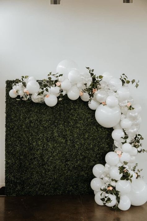 White And Greenery Balloon Arch, Balloon Garland Wedding Backdrop, Wedding Balloon Garland With Flowers, Greenery Wall With Balloon Arch, Balloon Arch Boxwood Wall, Minimalist Balloon Arch, Engagement Party Photo Backdrop Balloons, Wedding Backdrop Reception Balloons, Balloon Garland Wedding Reception