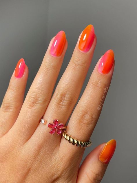Add a translucent touch to your manicure with these playful jelly nails! Whether your prefer to call them sheer nails or Korean-inspired nails, you can’t argue that this manicure technique is super pleasing to the eyes. Don't you just love these orange and pink jelly nails? They're perfect for the summer! Purple Orange Pink Nails, Orange Swirly Nails, Orange Swirl Nails, Nail Ideas For Summer, Gold Chrome Nails, Sunset Nails, Sheer Nails, Rainbow Nails Design, Orange Nail Designs