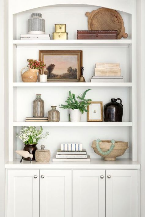 Our Stylist's Guide to Bookshelf Styling | Bria Hammel Interiors Bookshelf Styling Living Room, Bria Hammel Interiors, Bria Hammel, Styling Bookshelves, Deco Buffet, Built In Shelves Living Room, Shelf Decor Living Room, Bookshelves In Living Room, Decorating Bookshelves