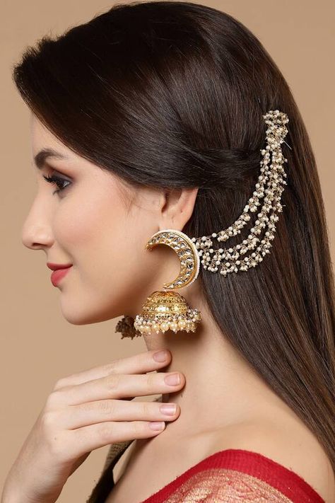 Gold plated jhumkas with white, cream kundan, pearl and natural stones embellishment. Component: 1 Pair Earring, 1 Pair Kanchain Type: Kundan, Pearl, Stone Composition: Metal Color: Gold,White,Cream Other Details:  Pearl drops Chain jhumkas Size (L x W):   Earring: 8 x 6 Kanchain: 15 x 2 Weight (in gms): 197  - Aza Fashions White Pearl Earrings Indian, Jhumka With Ear Chain Hairstyle, Pearl Hairstyles, Kundan Earrings Jhumkas, Kashees Mehndi, Kundan Jhumka Earrings, Kashee's Mehndi Designs, Bridal Jewelry Sets Brides, Hair Chain