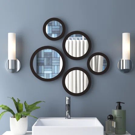 Wade Logan® Allysan Modern & Contemporary Mirror Set | Wayfair Black Wall Mirror Living Room, Small Round Mirrors On Wall, Mirror Arrangements On Wall, Circular Mirror Decor, Round Mirrors Decor Ideas, Small Circle Mirrors On Wall Ideas, Wall With Mirror Decor, Round Mirror Wall Decor Living Room, Circle Mirrors On Wall Decor