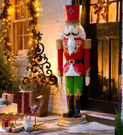 This Giant-Sized Nutcracker Statue will be the statement piece of your holiday décor. Display him indoors (if you have room!) or on the front porch to extend a greeting to all your guests. At nearly five feet tall, this jumbo nutcracker sculpture is a holiday classic, full of whimsical detail and vibrant color. Best Outdoor Christmas Decorations, Christmas Decorations Uk, Christmas Toy Soldiers, Nutcrackers Diy, Nutcracker Christmas Decorations, Christmas Entryway, Christmas Nutcrackers, Christmas Soldiers, Christmas Props