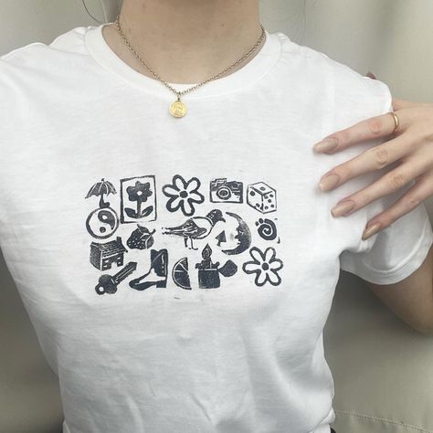 Lino print baby tee - style 3 🌿 (see my page for... - Depop Homemade Graphic Tees, Lino Print On T Shirt, Linocut Tee Shirt, Doodle T Shirt Design, Shirt Stamp Ideas, Stamp Shirt Diy, Stamped Tshirts, Painted Tee Shirts Diy, Linoleum Print Shirt