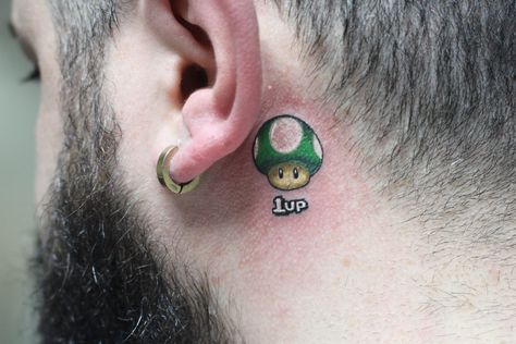 Mushroom Mario Tattoo, 1up Tattoo, Mushroom Mario, 1up Mushroom, Tattoos Behind Ear, Mario Tattoo, Le Tattoo, Mushroom Tattoo, Mushroom Tattoos