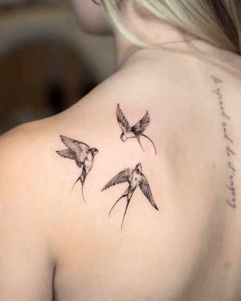 74 Inspiring Swallow Tattoos With Meaning - Our Mindful Life Swallow And Moon Tattoo, Delicate Upper Back Tattoo, Swallow Ankle Tattoo, Swallowtail Bird Tattoo, Swallow Knee Tattoo, Sparrow Tattoo With Flowers, Back Of Arm Bird Tattoo, Great Heron Tattoo, Swallow Back Tattoo