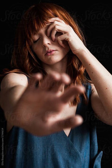 Girl covering face with hands by Ellie Baygulov for Stocksy United Hand Covering Camera Pose, Person Covering Face With Hands, Hand Pulling Face, Hand Covering Face Pose, Hand Grabbing Face Reference, Covering Face Pose, Covering Eyes With Hands, Hands Covering Face, Girl Covering Face