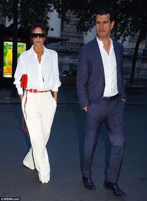 Cut a stylish figure like Victoria Beckham in white trousers #DailyMail Women White Trousers Outfit, Cream Trousers Outfit Summer, White Satin Trousers Outfit, Cream Trousers Outfit Classy, White Trouser Outfit Women, Cream Trouser Outfit Women, White Trousers Outfit Summer, White Trouser Outfit, Summer Night Out Outfits