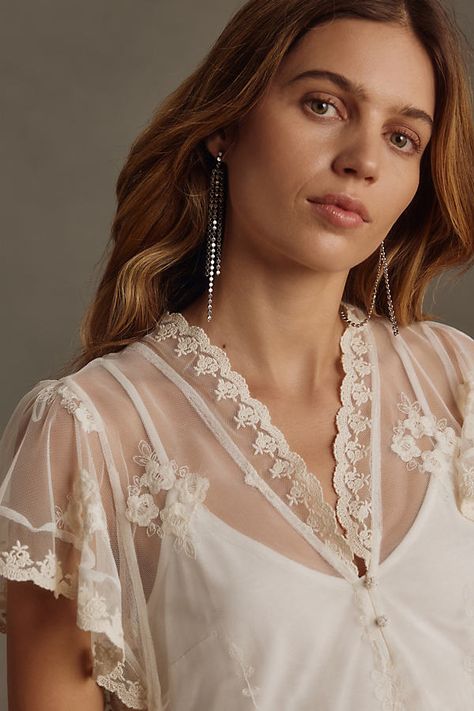 Polyester; cotton embroidery; viscose contrast Pullover styling Hand wash Imported | Embroidered Flutter-Sleeve Top by Anthropologie in White, Women's, Size: XS, Polyester/Cotton/Viscose Chiffon Tops Blouses Classy, Ethereal Outfits, Sheer White Shirt, White Tops Outfit, Lace Camisole Top, White Sheer Top, Chiffon Tops Blouses, Bridal Tops, Bachelorette Outfits