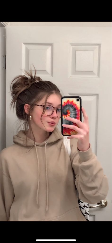 beige, brown, messy bun, glasses