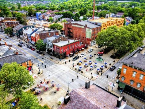 This Small Stretch Of Shops In Kentucky Offers The Perfect Way To Spend An Afternoon Kentucky Attractions, Covington Kentucky, Covington Ky, Southern Hospitality, Clock Tower, Iconic Landmarks, Park City, Main Street, Local Businesses