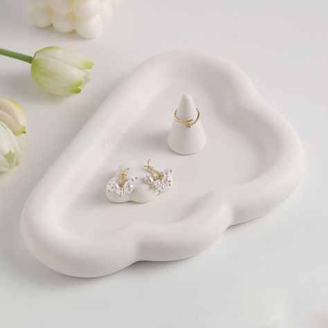 PRICES MAY VARY. Product Size: jewelry tray dish(9.5"L x 6.5"W x 1.2"H),ring holder(1.18"W x 2"H),Earrings holder(2"L x 1.46"W x 0.6"H). Unique Aesthetic Design:Inspired by ethereal clouds,the design of this trinket tray adds a touch of romance and whimsy.Its unique cloud shape will add an artistic touch to your decor. Versatile Storage:This decorative trays is not only perfect for storing rings,earrings, necklaces,and other small jewelry items,but also perfect for dresser,watch, key tray for en Cute Ceramic Plate, Vanity Aesthetic, Jewlery Holder, Cloud Decor, Ceramic Jewelry Dish, Cloud Decoration, Key Tray, Dish Holder, Clay Crafts Air Dry