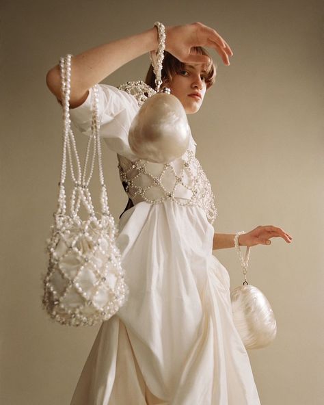 SIMONE ROCHA on Instagram: “SS21 Pearl Perspex Egg Bags, Pearl Beaded Bag, and Hand Beaded Pearl Bustier for @atmos styled by @robbiespencer shot by @ben_toms…” Haute Couture, Crop Top Outfits, Couture, Pearl Bustier, Pearl Beaded Bag, Pearls Photography, Mermaid Aesthetic, Exclusive Clothing, Beaded Bag