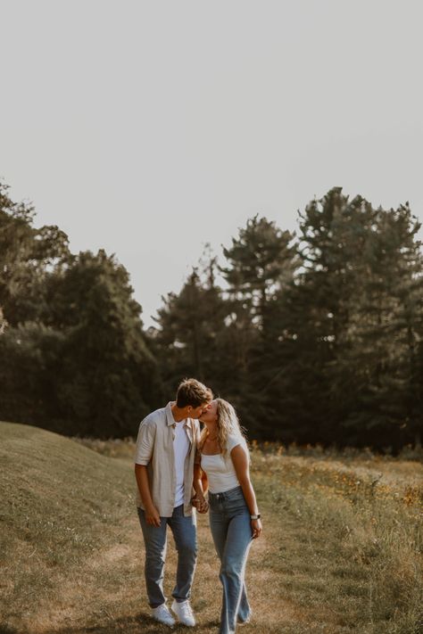 Engagement photo Black Shirt Engagement Pictures, Overall Engagement Photos, Morning Engagement Photos, Engagement Photos Open Field, Shy Engagement Photos, Engagement Farm Photos, One Year Couple Pictures, Engagement Photos With Ring, Engagement Photos Field Picture Ideas