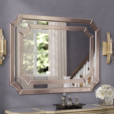 Able to open up a room, let the bright light bounce around, and add style to your space, mirrors are must-haves for any home. Take this one for example: Curved and finished in mirrored bronze, its manufactured wood frame defines this piece as a glamorous accent. Its gleaming glass center is the star, echoed with another reflective ring for extra depth and dimension. Measuring 36'' H x 48'' W x 1'' D, it stands out in both fashion and form. | Willa Arlo™ Interiors Milazzo Contemporary Accent Mirr Mirror Over Mantle, Entry Decor, Mirror Wood, Contemporary Mirror, Wayfair Furniture, Accent Mirror, Mirror Set, Round Wall Mirror, Mirrors Wayfair