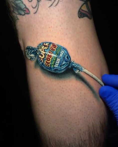 Tattoo Snob on Instagram: “Blow Pop tattoo by @mikedevries at @mdtattoostudio in Los Angeles, CA #mikedevries #mdtattoostudio #losangeles #la #california #blowpop…” Los Angeles, Tattoo Placements, Tumblr, Angeles, Pop Tattoo, Blow Pop, Blow Pops, Worlds Best Tattoos, Blue Tattoo