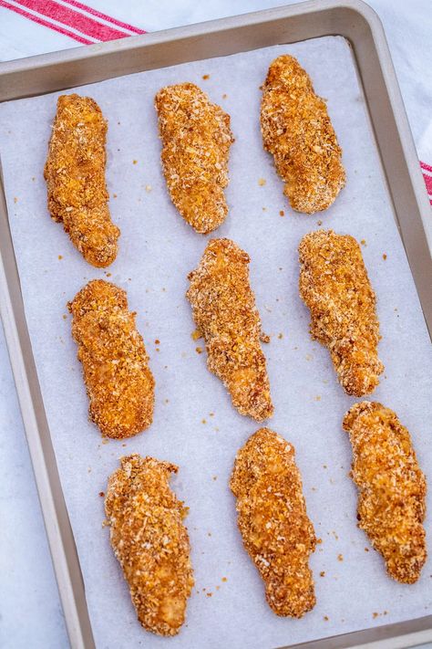 Breaded Chicken Tenders Fried, Simple Chicken Strip Recipes, Easy Oven Fried Chicken Tenders, Oven Fried Chicken Tenders Crispy, Crispy Oven Baked Chicken Tenders, Baked Crispy Chicken Tenders, Homemade Chicken Tenders Baked, Breaded Oven Baked Chicken, Baked Chicken Tenders Recipes Oven