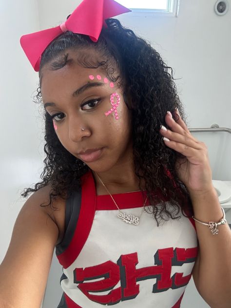 Cheerleader Game Day Makeup, Competition Hair Cheerleading, Comp Cheer Makeup, Cute Cheer Makeup, School Cheer Makeup, Pink Out Face Paint Ideas, Comp Cheer Hair, Pink Out Football Game Face Paint, Sport Face Paint Ideas