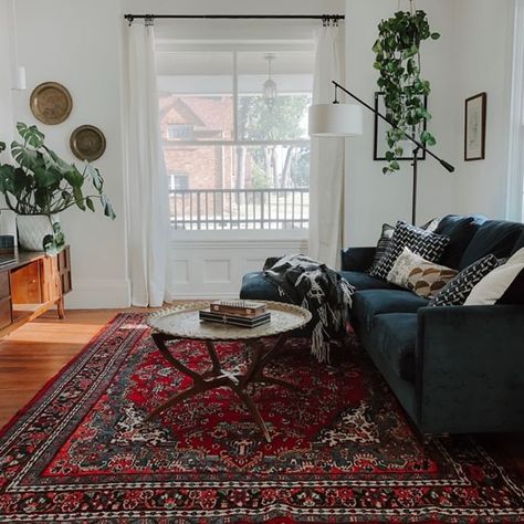 White living room, blue, navy velvet sofa, Persian rug, plants, white curtains, black curtain rod, brass coffee table. Miranda Schroeder Blog #Regram via @www.instagram.com/p/B1ztDkpn1ne/ Moody Victorian Home, Red Rug Living Room, Persian Rug Living Room, Moody Victorian, Brass Coffee, Room Blue, Living Room Red, Appartement Design, Victorian Home