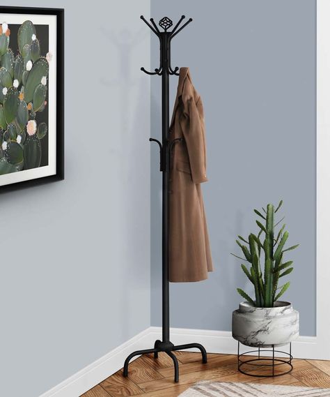 Black Metal Coat Rack. With a contemporary monochromatic finish and simple silhouette, this coat rack provides stylish storage to coats, purses and more. 70'' H x 19'' diameter12 hooksMetalAssembly requiredImported Coat Stand Hallway, Downstairs Wc, Metal Coat Rack, Old Brick Wall, Standing Coat Rack, Coat Stand, The Monarch, Coat Stands, House Decorating