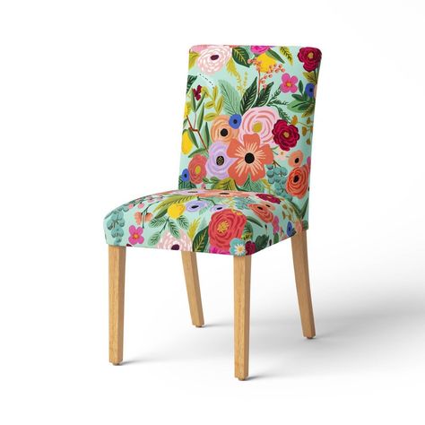 Elevate your dining space with this Dining Chair from Rifle Paper Co. x Target. This armless chair features a wood frame with light wood legs and floral upholstery. The padded seat and back covered in cotton fabric helps keep you comfortable, and the unique look makes for a charming focal point in your home. Rifle Paper Co. is a stationery and lifestyle brand based in Winter Park, Florida, founded in 2009 by husband-wife team Nathan and Anna Bond. Anna’s hand-painted illustrations and distinctiv Target Dining Chairs, Target Ottoman, Target Storage, Hand Painted Chairs, Target Furniture, Parsons Dining Chairs, Floral Upholstery, Upholstered Storage Bench, Upholstered Accent Chairs