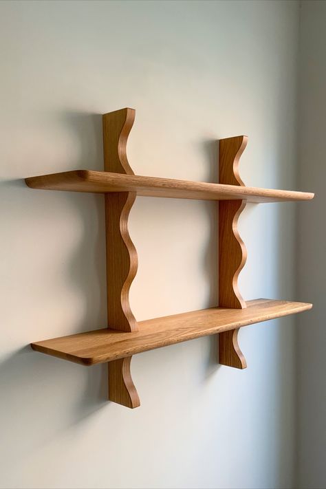 Designed and made in Brooklyn!
The Wave wall mounted shelf is shown here in solid red oak with a natural finish. Keyhole brackets are installed in the shelf and can be hung with wall anchors.

Made to order with a 2-3 week lead time
Contact me for details on custom sizes or other lumber options Wooden Shelf Brackets, Diy Shelf Brackets, Plywood Projects, Wall Mounted Shelf, Wave Wall, Wooden Wall Shelves, Solid Wood Shelves, Wall Shelves Design, Mounted Shelves