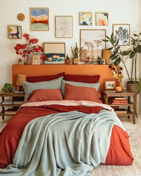 Bohemian Area Rugs Bedroom, Citrus Themed Bedroom, Artsy Master Bedrooms Decor, Soft Colorful Bedroom, Brick Red Bedding, Mexican Modern House Bedroom, Mid Mod Boho Bedroom, Mid Century Modern Cozy Bedroom, Muted Colorful Bedroom