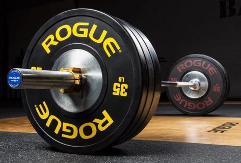 A Rogue Olympic weightlifting barbell - loaded with Rogue training bumper plates. Rogue Fitness makes the best olympic barbells for home and garage gyms. Olympic Weightlifting, Rogue Fitness, Jiu Jitsu, Leg Roller, Home Gym Garage, Crossfit Box, Olympic Weights, Gym Weights, Fitness Blender