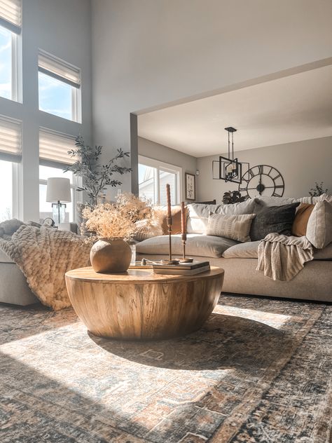 Grey Rug Grey Couch Living Room, Cozy Spacious Living Room, Gray Beige Wood Living Room, Dark Gray Couch And Rug, Organic Modern Living Room With Grey Couch, Grey Couch Brown Accents, Living Room Decor Sectional Couch Grey, Dark Blue Living Room Rug, Gray Green Neutral Living Room