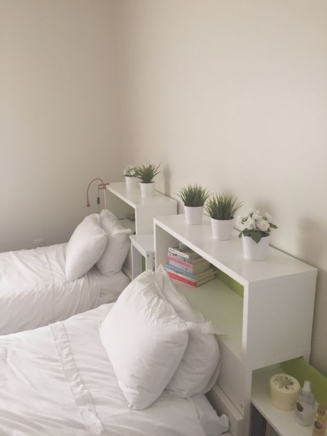 Ikea bed & bed board with white plant pots and a mix of green plants & white flowers. This a 2 single bed bedroom with soft beige walls. The bed board is used for book storage as well as a bedside table. Ikea Bed Single, 2 Single Bed Bedroom Ideas Aesthetic, Single Bedroom Minimalist, Minimalist Bedroom Twin Bed, Minimalist Bedroom Single Bed, Two Single Beds In One Room Ideas Modern, Two Bed Bedroom Aesthetic, Room Ideas Aesthetic Single Bed, Diy Single Bed