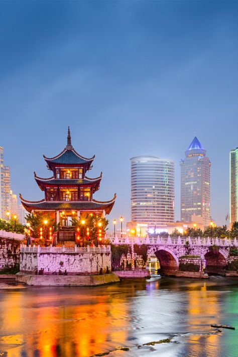 Jiaxiu Pavilion of Guiyang City is built on the Nanming River in the south of the city, with a huge stone for a base. It's a symbol of the city, and anyone who has ever been to Guiyang will climb the pavilion to see the scenery. The building was built during the Wanli period of the Ming Dynasty (1598) and the existing structure was reconstructed during the Xuan Tong period of the Qing Dynasty (1909). China, Guiyang, The Pavilion, Ming Dynasty, Qing Dynasty, The Building, The South, Big Ben, The City