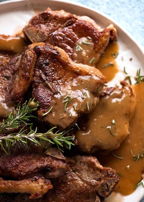 Plate of Lamb Chops with Rosemary Gravy garnished with rosemary Rosemary Gravy, Lamb Loin Recipes, Lamb Chops Marinade, Garlic Lamb Chops, Lamb Gravy, Best Lamb Recipes, Lamb Sauce, Lamb Loin Chops, Lamb Steaks