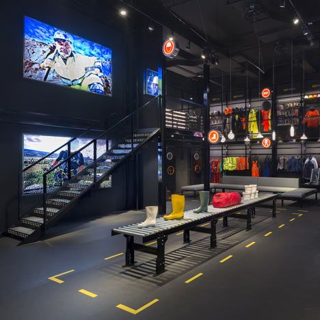 Boutique for a safety equipment brand in Singapore by Ministry of Design. Bulkhead Doors, Workwear Store, Modern Warehouse, Retail Architecture, Warehouse Design, Showroom Design, Retail Store Design, Retail Interior, Safety Equipment